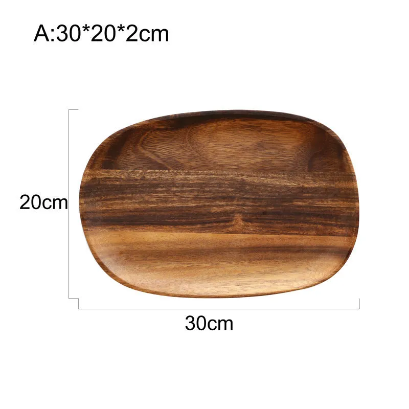 Acacia Japanese snack plate hand-polished natural wood with visible grain and mineral lines on a flat surface