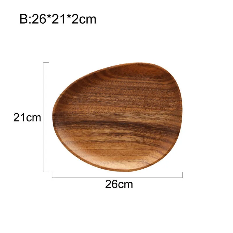 Acacia Japanese snack plate hand-polished natural wood with visible grain and mineral lines on a flat surface
