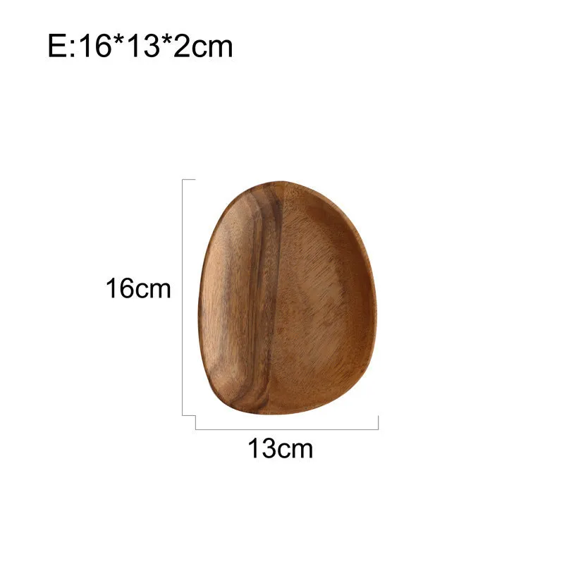 Acacia Japanese snack plate hand-polished natural wood with visible grain and mineral lines on a flat surface