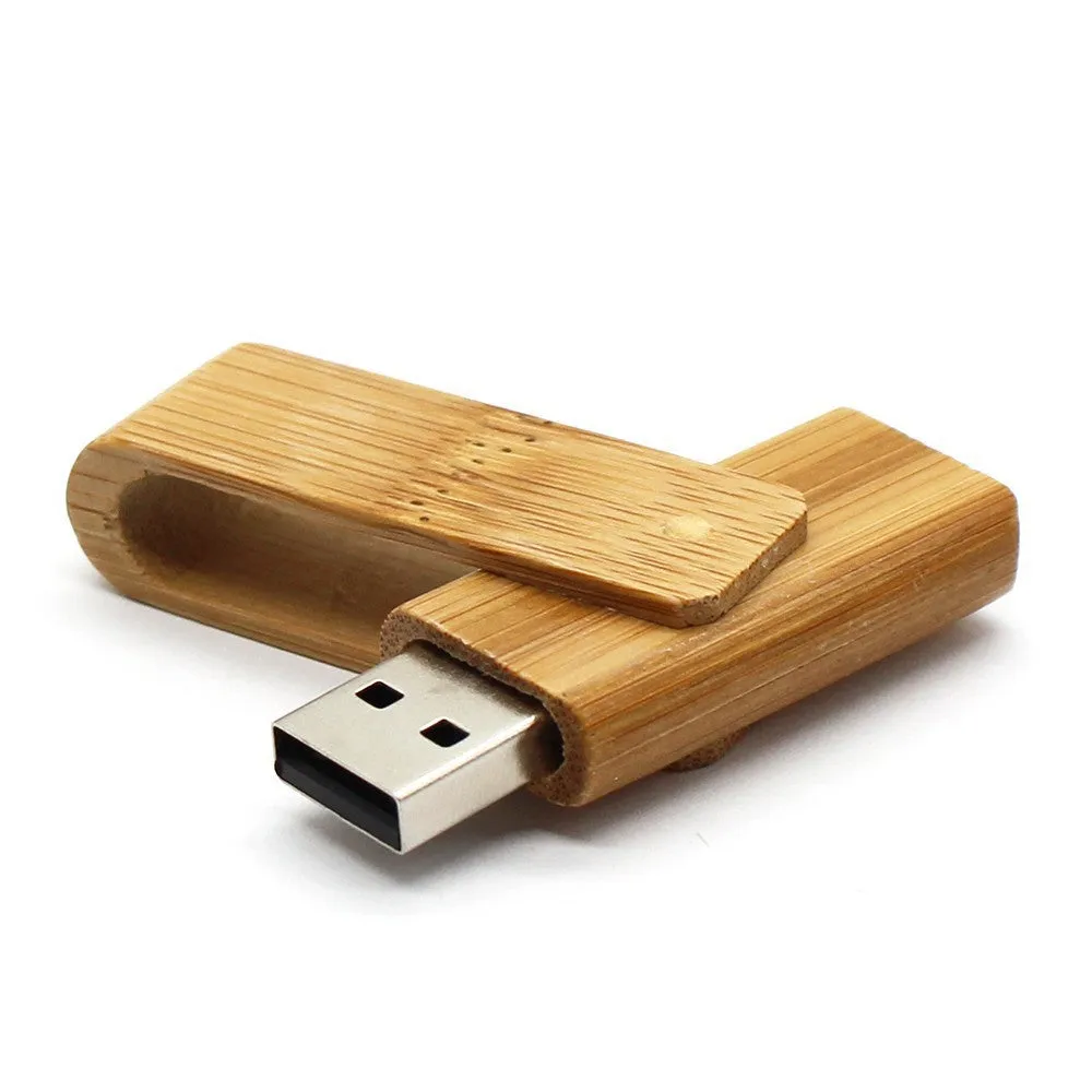 Pink wooden USB flash drive with rotating clip on a light background showing its natural wood grain and compact size