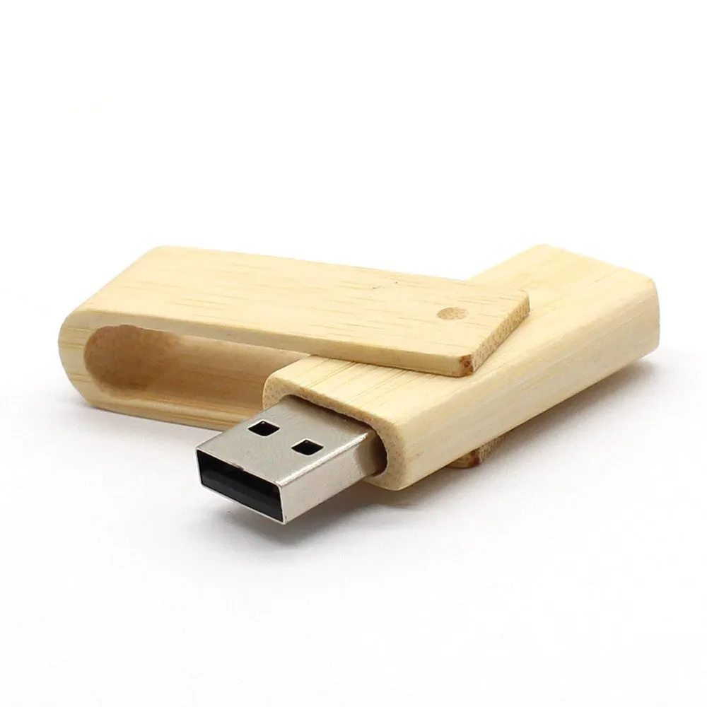 Pink wooden USB flash drive with rotating clip on a light background showing its natural wood grain and compact size