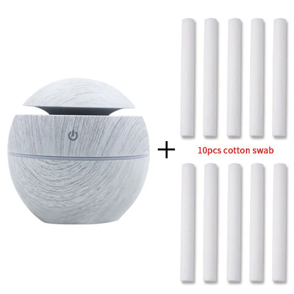 Mini USB aroma diffuser humidifier with wood grain finish, one fog outlet, and mechanical controls on a white background