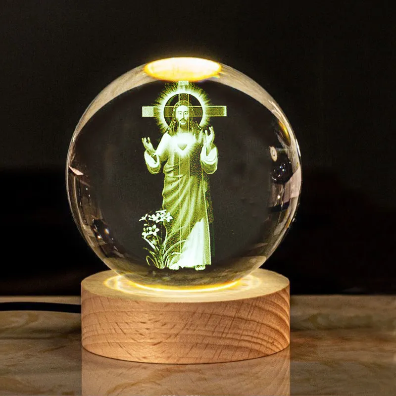 6cm white crystal ball desk ornament with laser-engraved cross design on a solid wood warm light base.