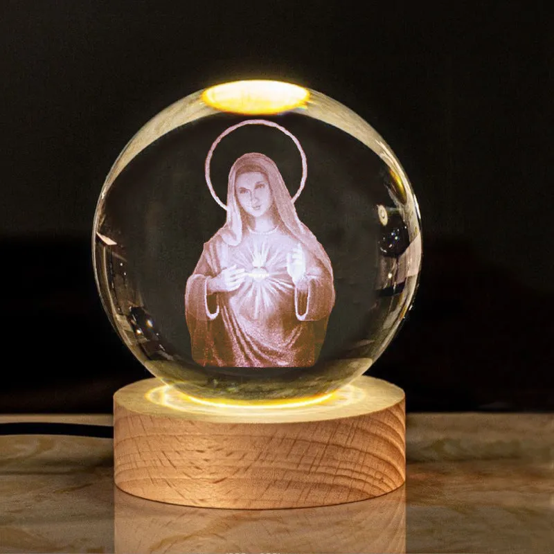 6cm white crystal ball desk ornament with laser-engraved cross design on a solid wood warm light base.