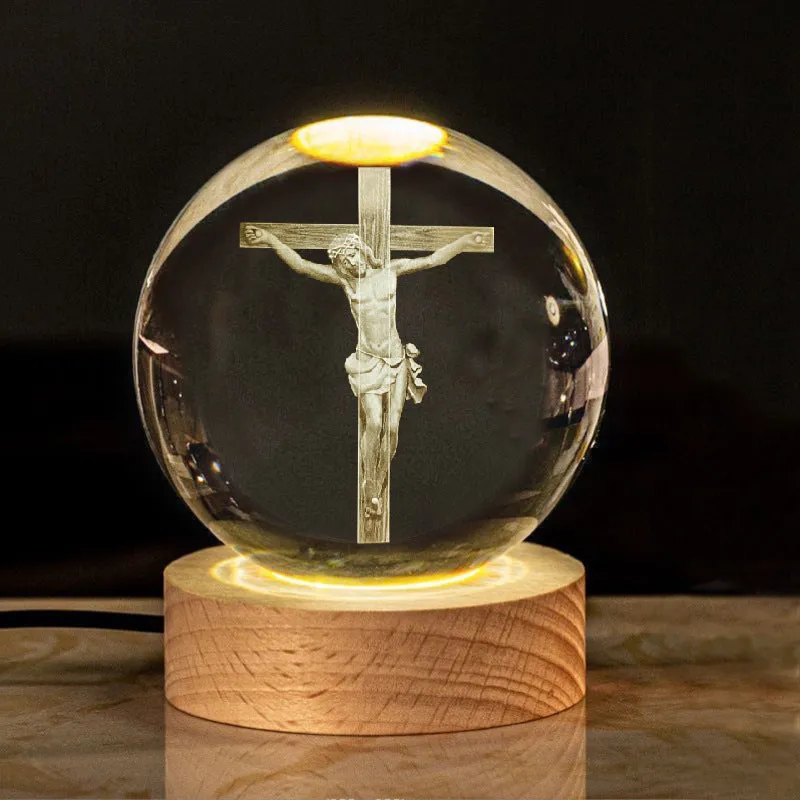 6cm white crystal ball desk ornament with laser-engraved cross design on a solid wood warm light base.