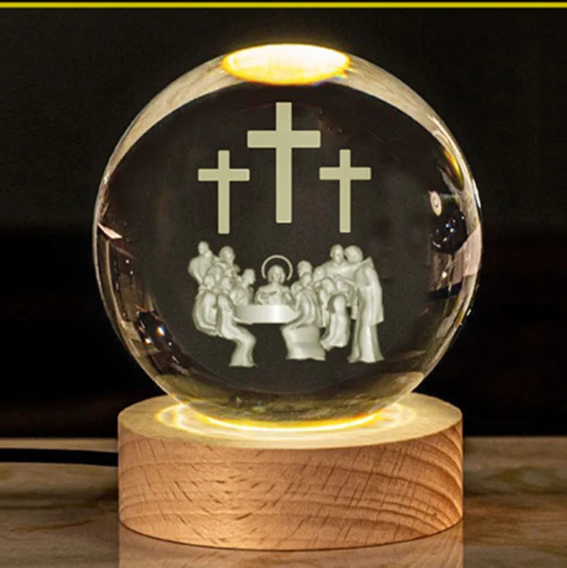 6cm white crystal ball desk ornament with laser-engraved cross design on a solid wood warm light base.