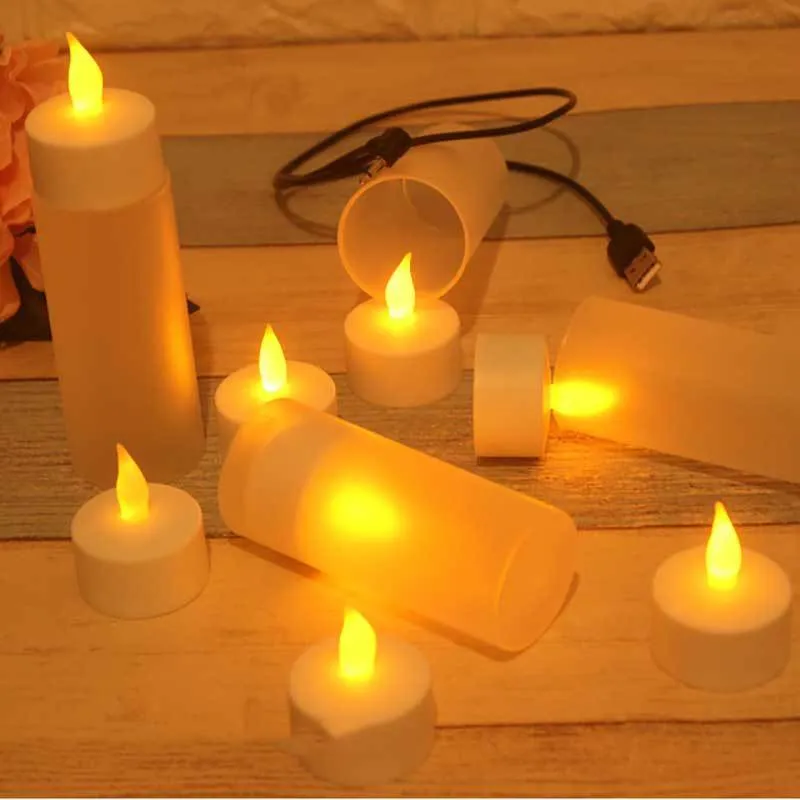 White plastic USB rechargeable LED candle lamp with flame-shaped head on plastic cup