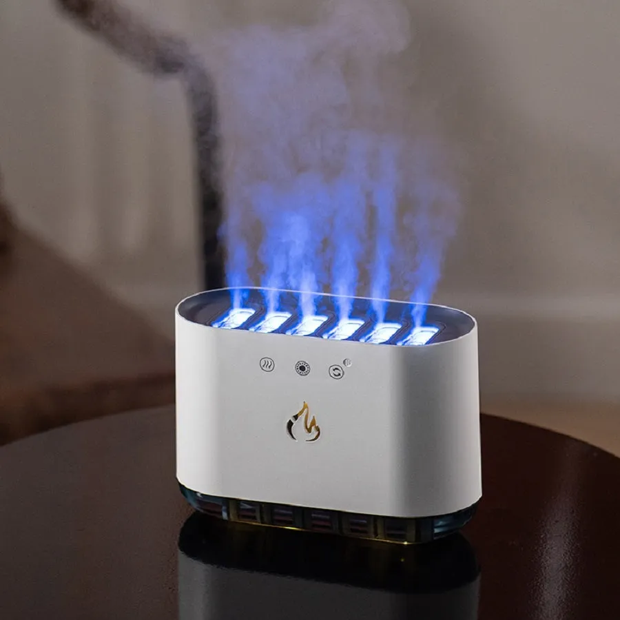 White cylindrical humidifier with colourful LED base and mist rising from the top.