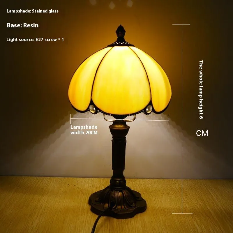 Beige fabric bedside lamp with simple modern design measuring 20cm wide