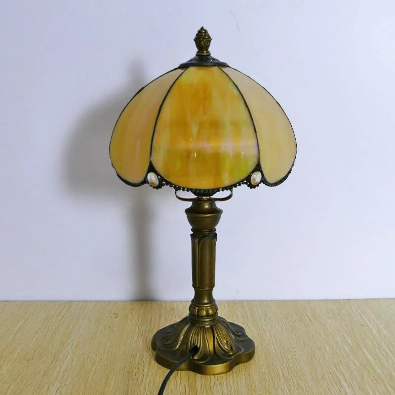 Beige fabric bedside lamp with simple modern design measuring 20cm wide