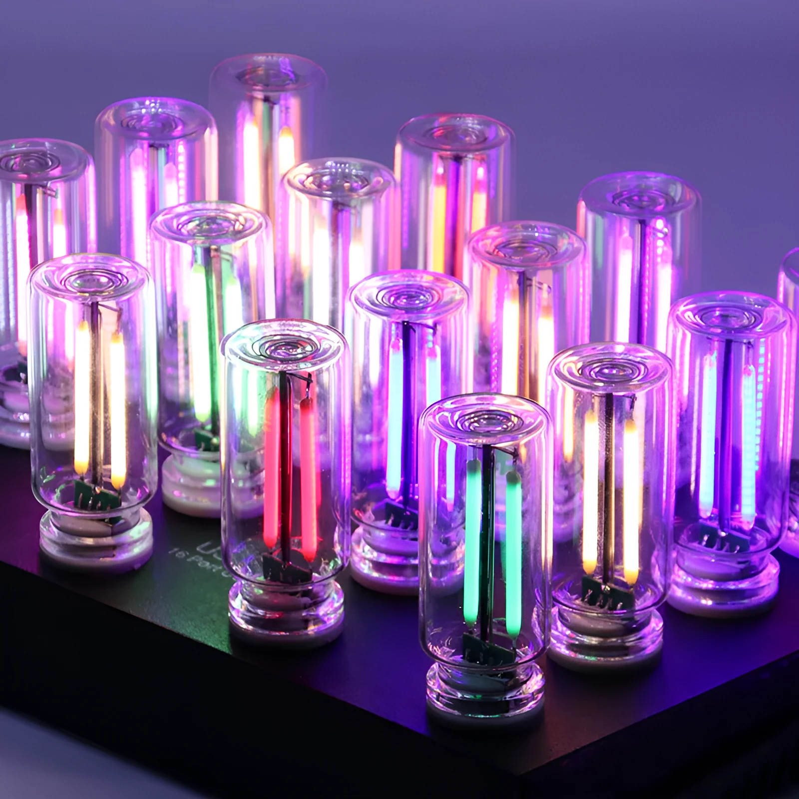 Small transparent glass USB touch night lamp with warm white light on a desk