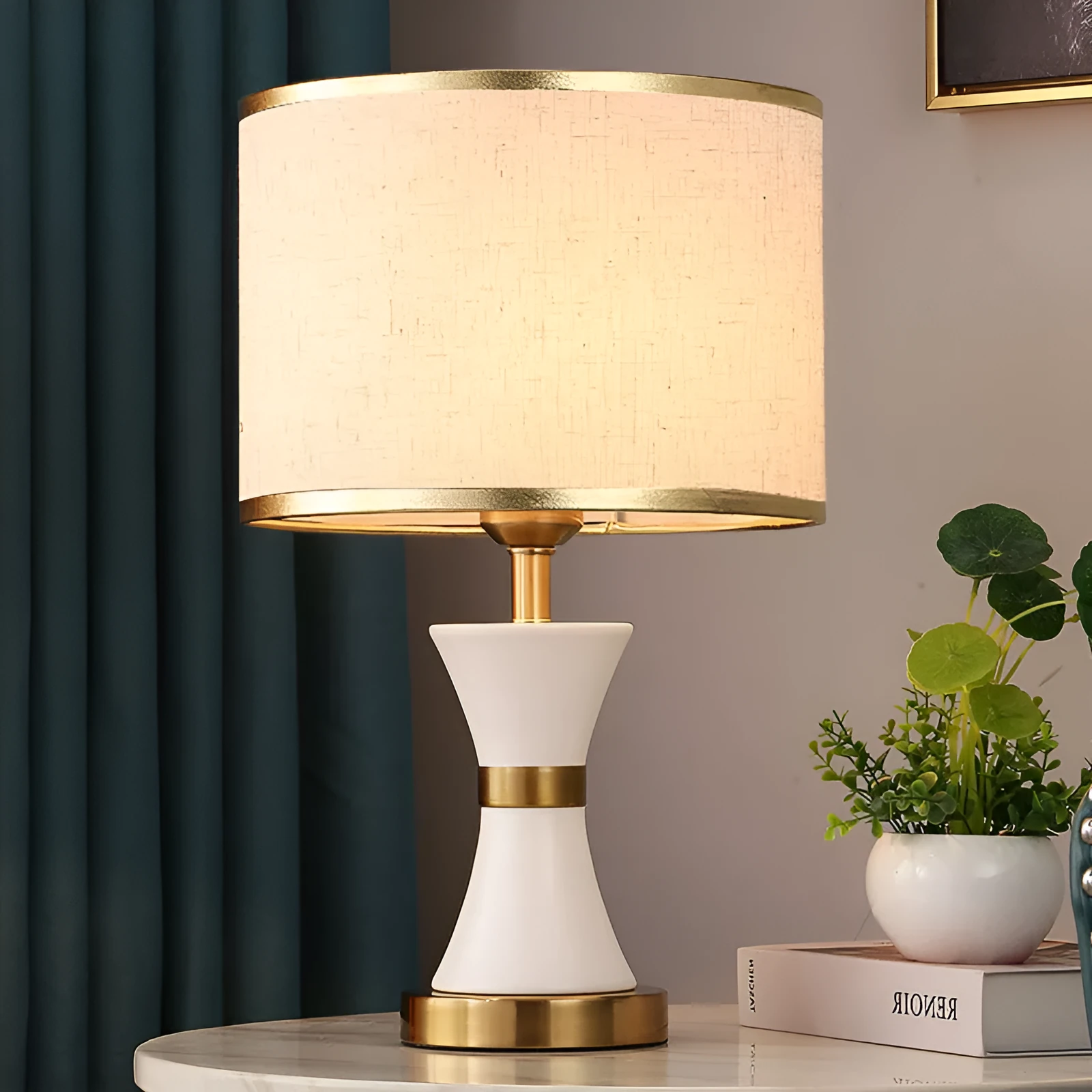 Desk lamp with iron base and fabric shade in choice of black, gold or white colours