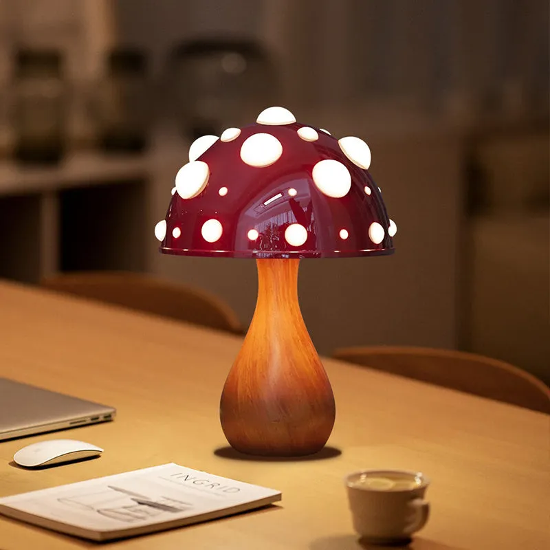 Modern mushroom-shaped table lamp with a touch dimming base on a wooden surface.
