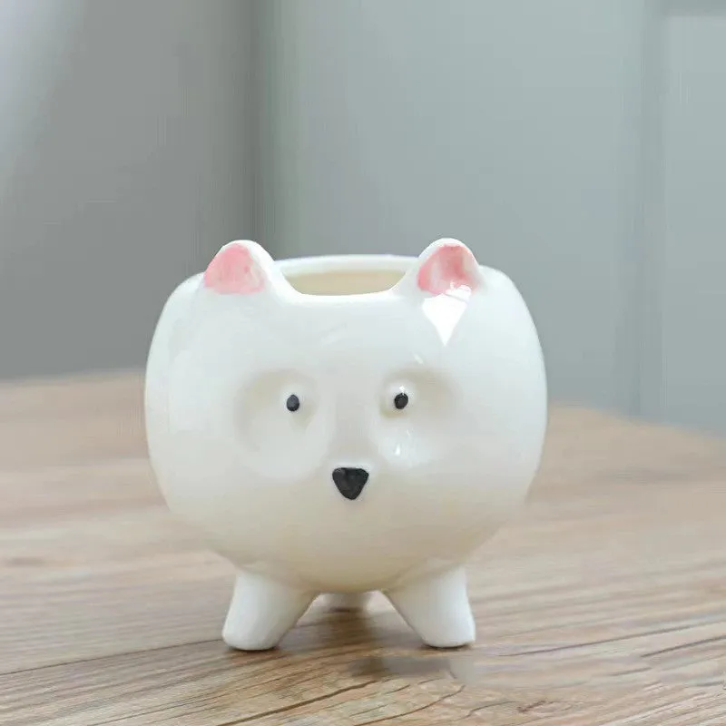 Hand painted ceramic succulent flowerpot with cartoon animal design in pastoral style.