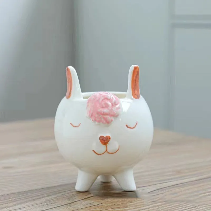 Hand painted ceramic succulent flowerpot with cartoon animal design in pastoral style.