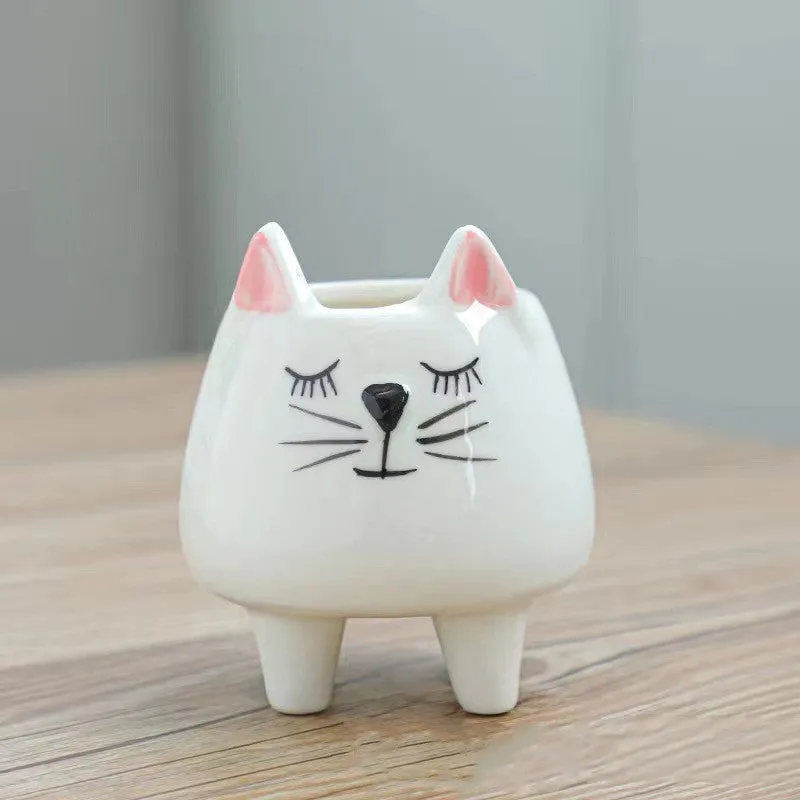 Hand painted ceramic succulent flowerpot with cartoon animal design in pastoral style.