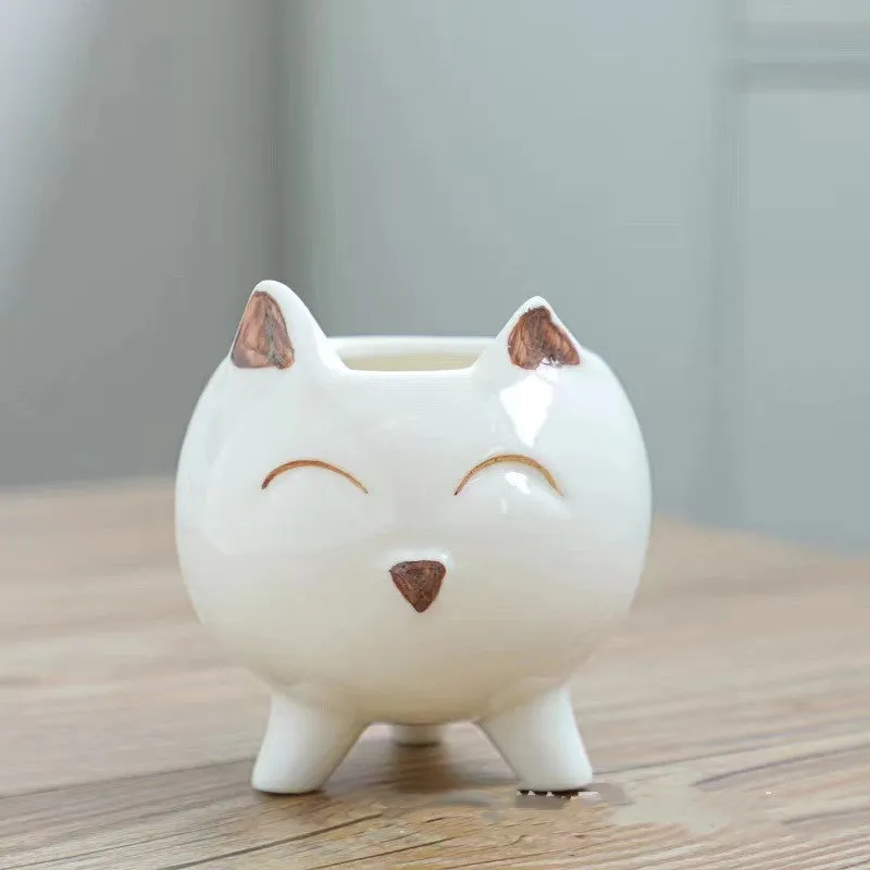 Hand painted ceramic succulent flowerpot with cartoon animal design in pastoral style.