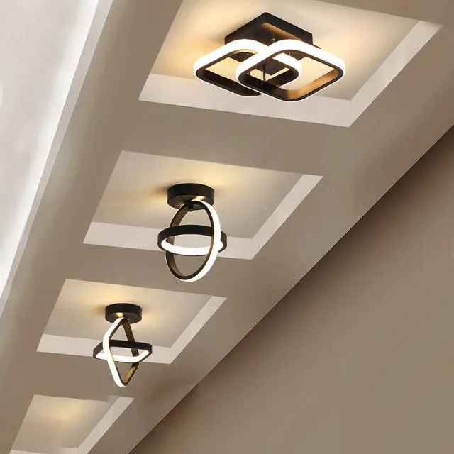 Modern round ceiling light in black or white with 21cm diameter and LED light source