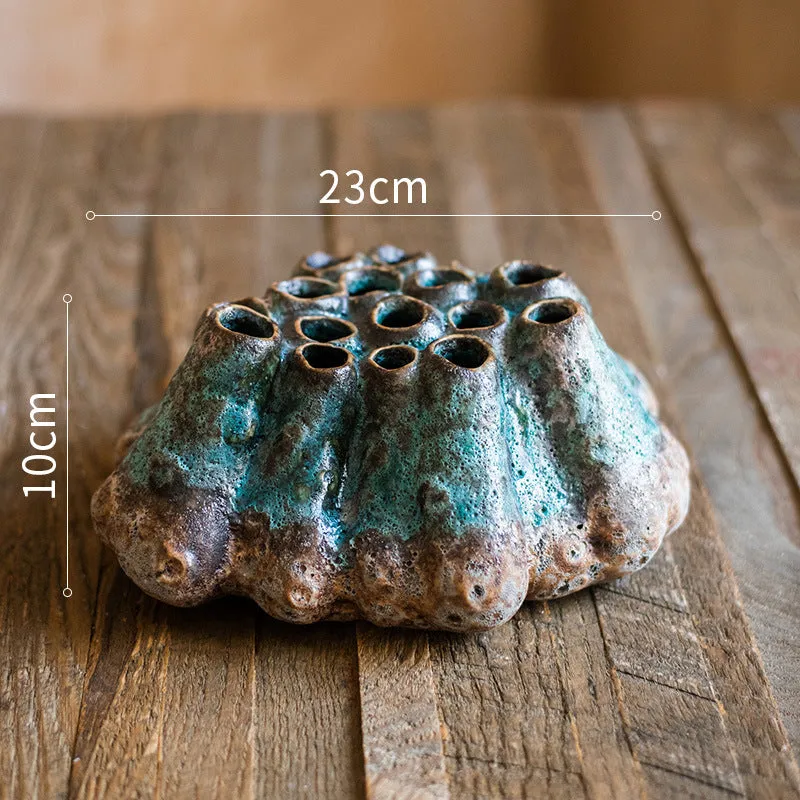 Medium ceramic barnacle vase with porous textured surface in new Chinese style