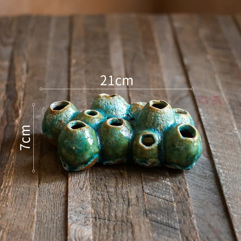Medium ceramic barnacle vase with porous textured surface in new Chinese style