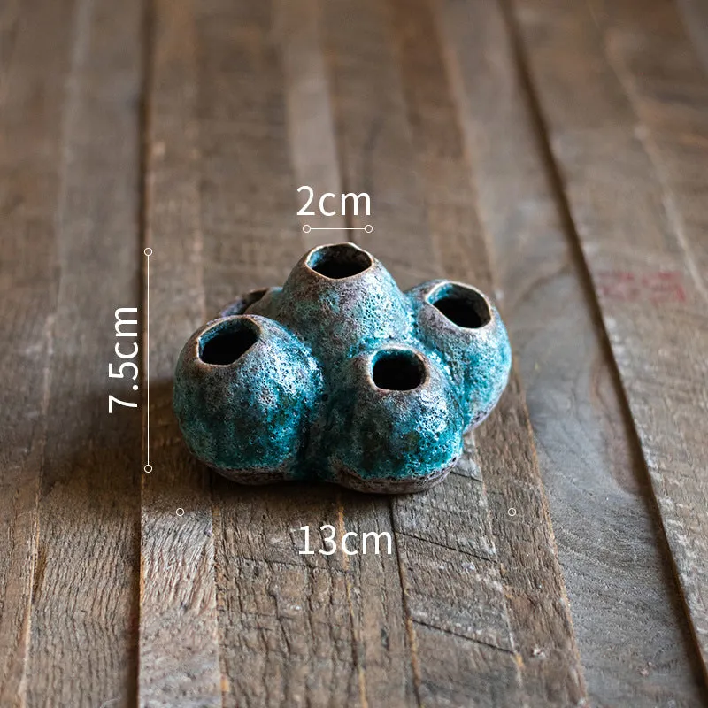 Medium ceramic barnacle vase with porous textured surface in new Chinese style