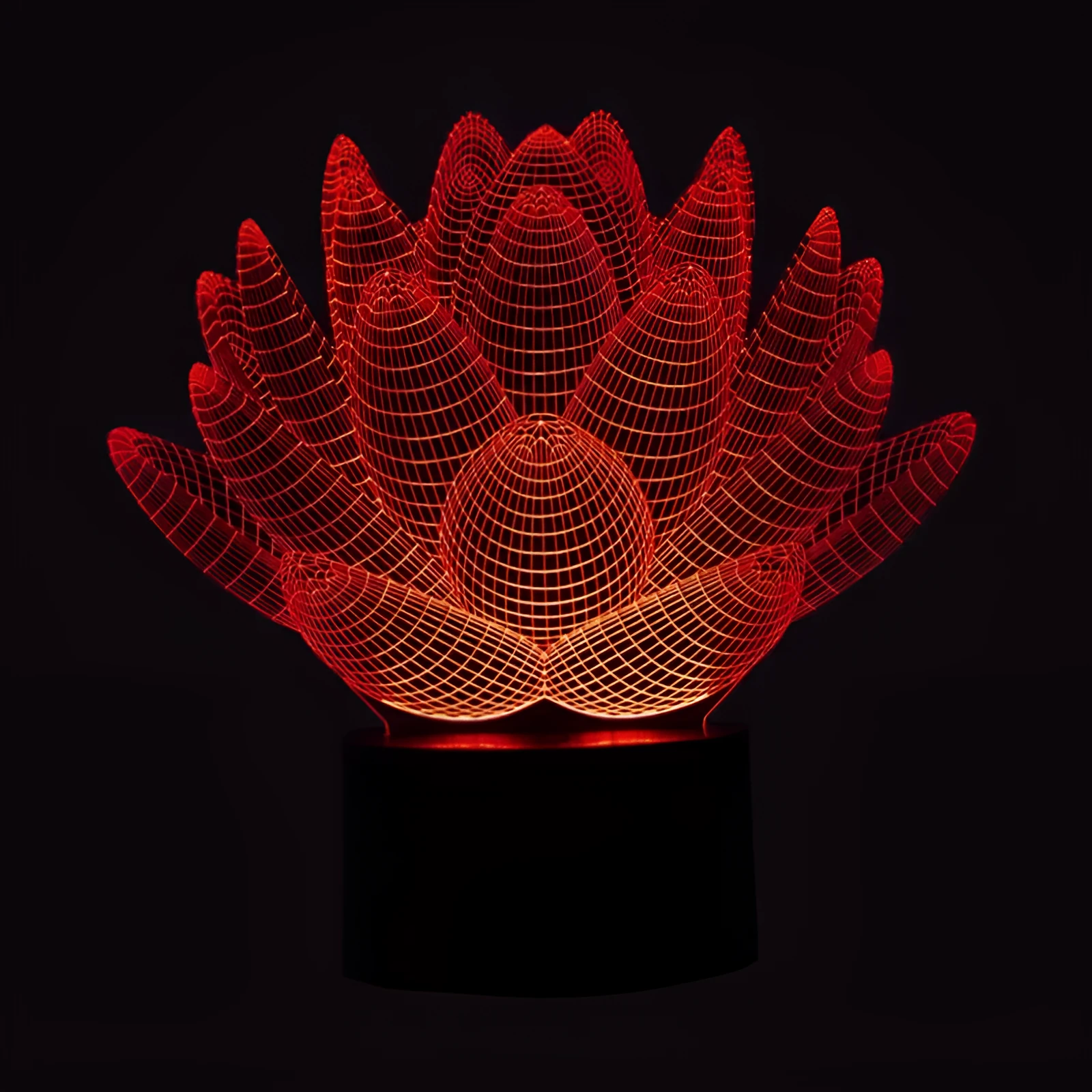 White lotus-shaped acrylic night light with LED base and touch controls on a wooden table.