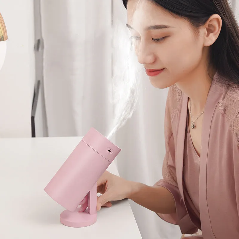 White USB desktop humidifier with folding bracket extended, showing compact 70x70mm base and 156mm height