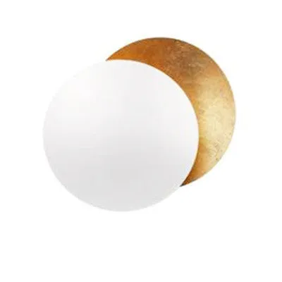 Round solar eclipse design wall lamp with iron construction in black and brass finish
