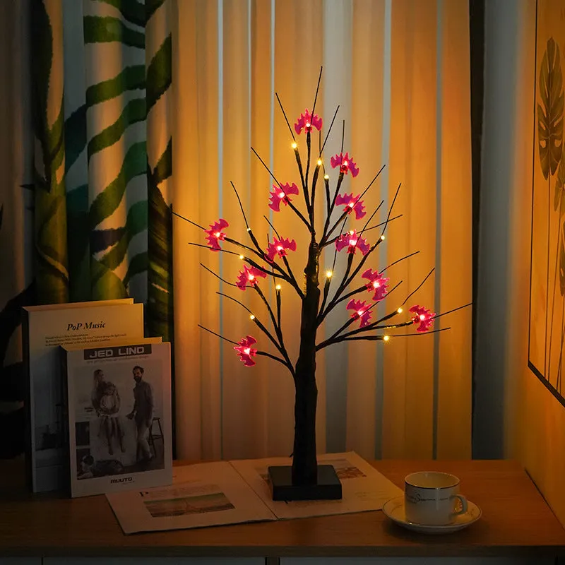 60cm tall plastic LED birch tree night light with warm white LEDs on a black birch design.