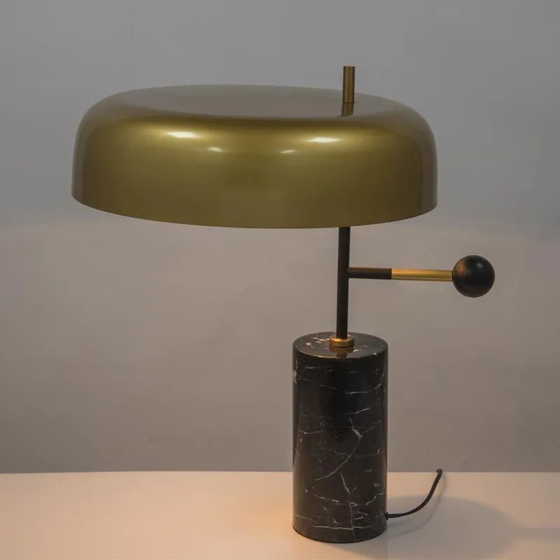 European style decorative table lamp with warm light on a bedside table