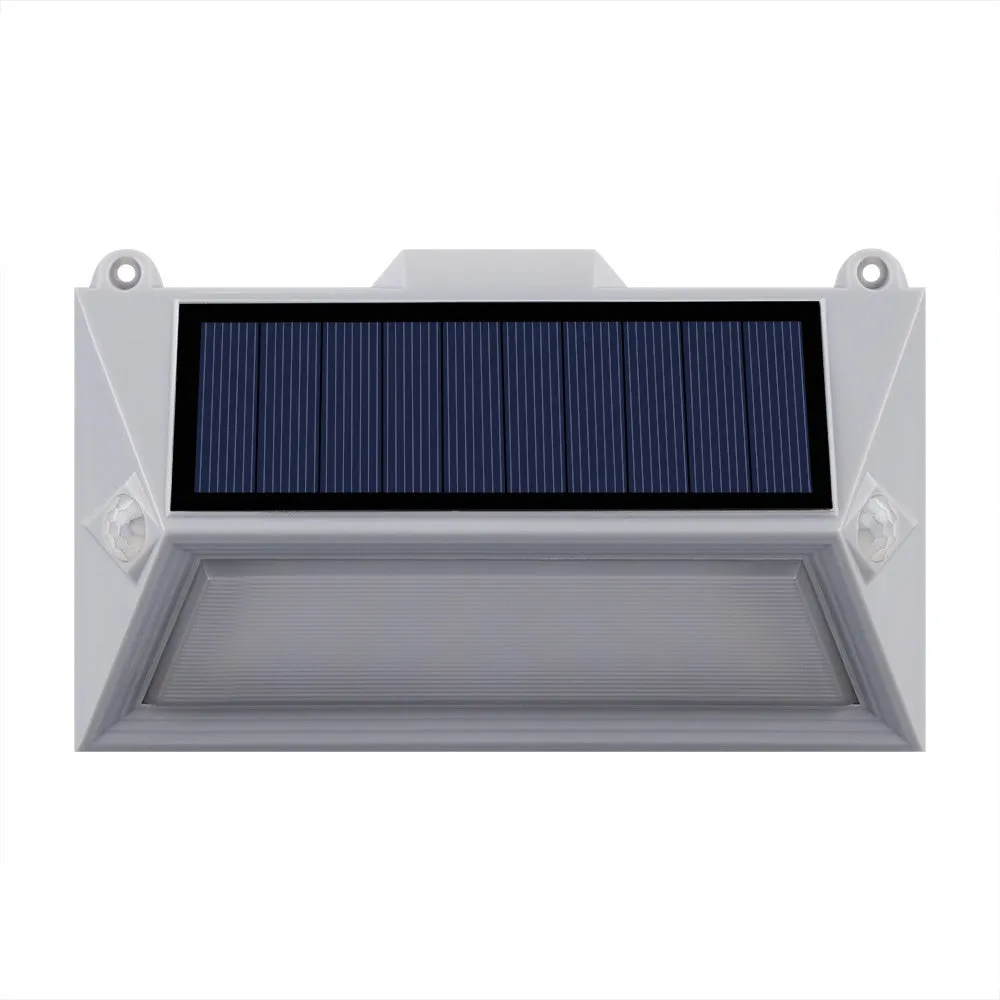 Solar-powered outdoor motion sensor step light in an abstract design.