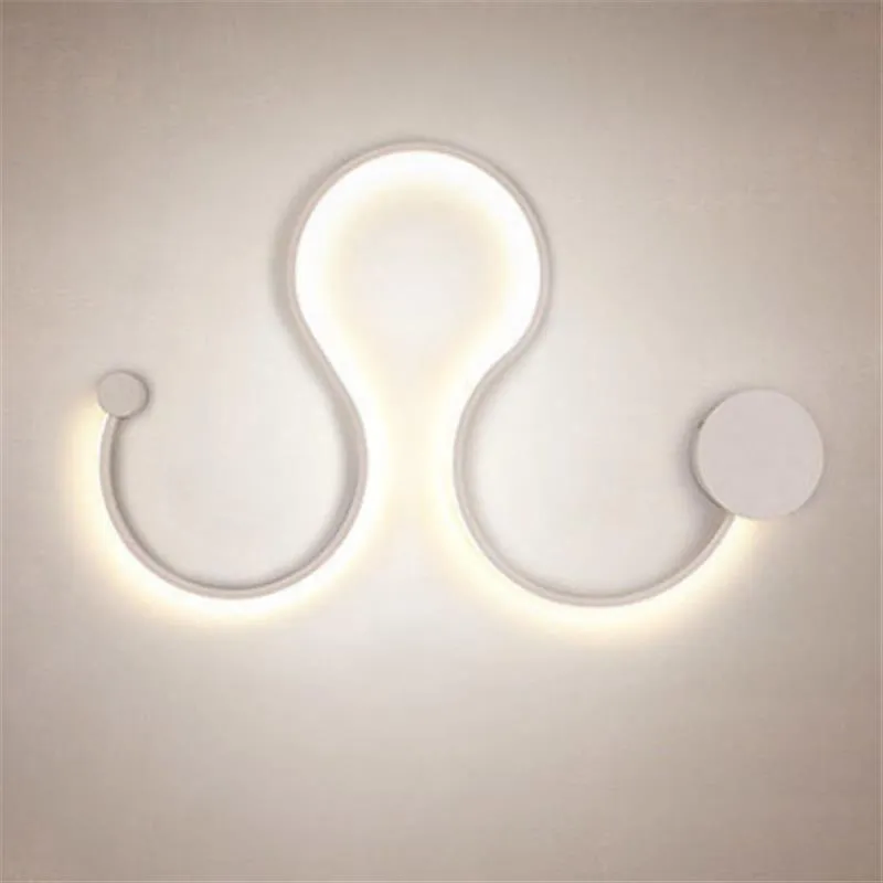 Black and white aluminium shade LED wall lamp in small, medium, large, and plus sizes