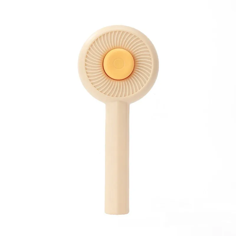 A beige pet hair dryer and a blue whirlpool comb for dog grooming and deshedding.