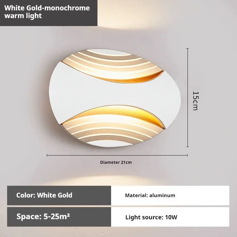 Modern minimalist aluminium wall lamp with IP65 rating, shown in black gold finish.