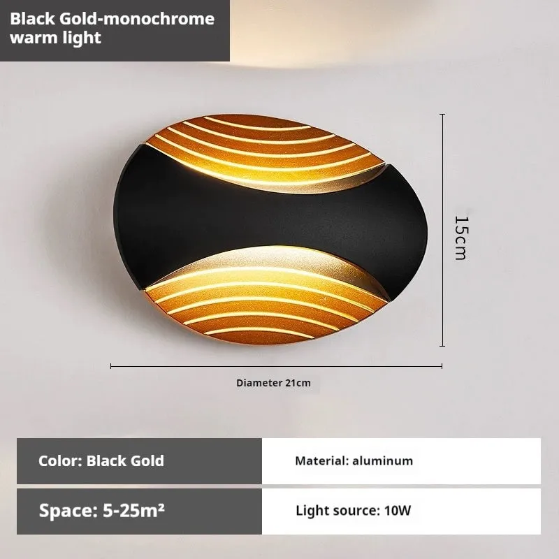 Modern minimalist aluminium wall lamp with IP65 rating, shown in black gold finish.