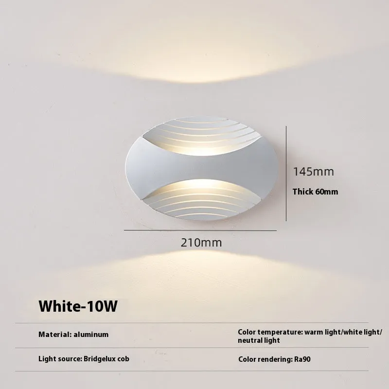 Modern minimalist aluminium wall lamp with IP65 rating, shown in black gold finish.