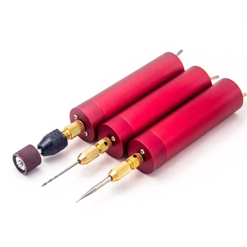 Micro aluminium USB electric grinder with three drill bits on a wooden table