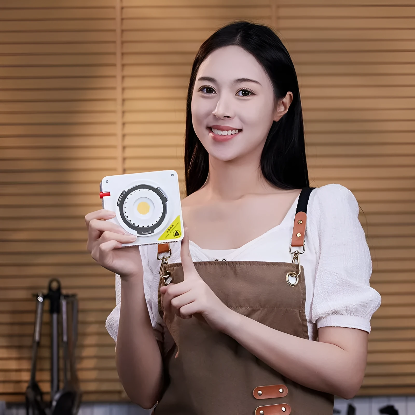 shenniu ML100Bi continuous LED video light with lenses and accessories on a table