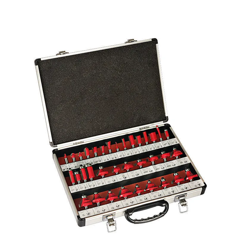 A set of 35 metal woodworking milling cutters and side cutters with different coloured handles on a workbench.
