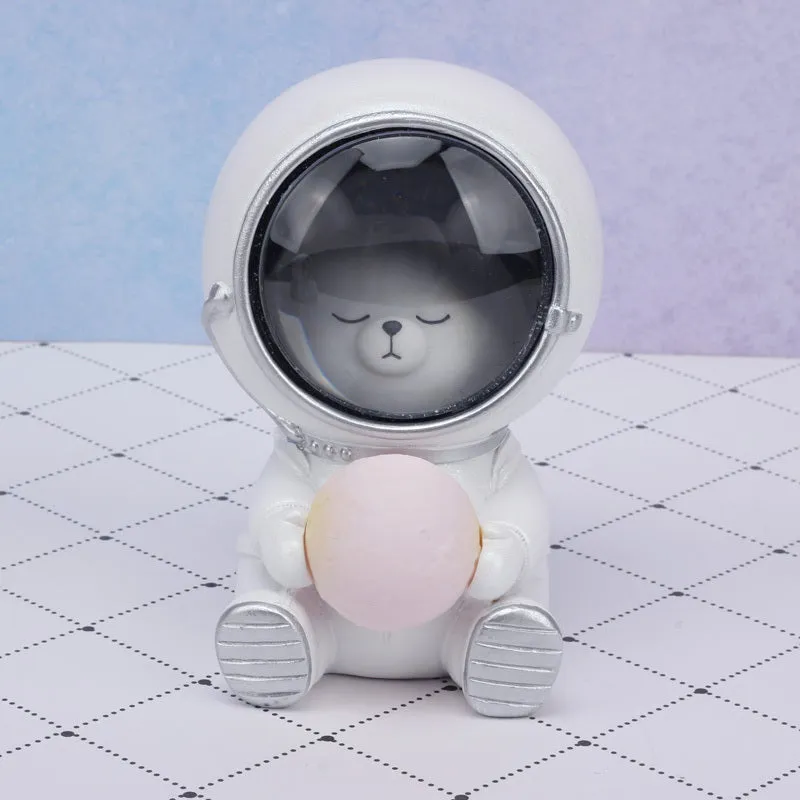 Starry sky projection night light in cute resin animal shapes including a bear, powered by USB or batteries.