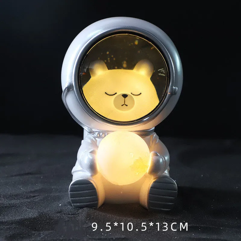 Starry sky projection night light in cute resin animal shapes including a bear, powered by USB or batteries.