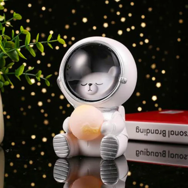 Starry sky projection night light in cute resin animal shapes including a bear, powered by USB or batteries.