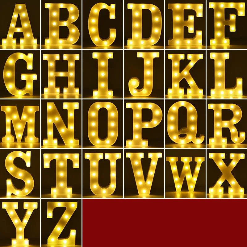 Plastic LED letter light decoration spelling a message, 22cm in height.