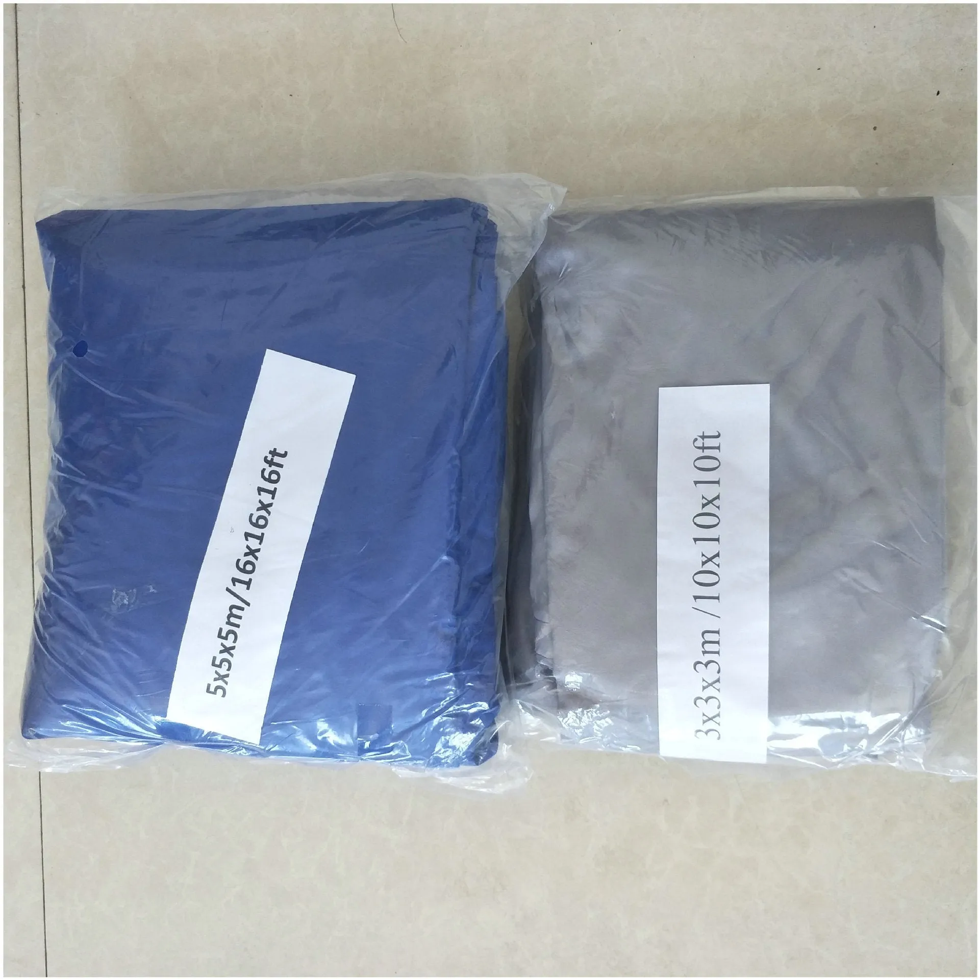 Blue curved square polyester shade sail measuring 3 metres by 4 metres for outdoor UV protection
