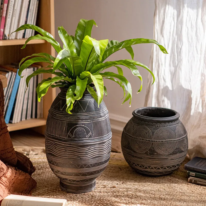 Medium cement African art decorative flower pot with ethnic design and drainage holes