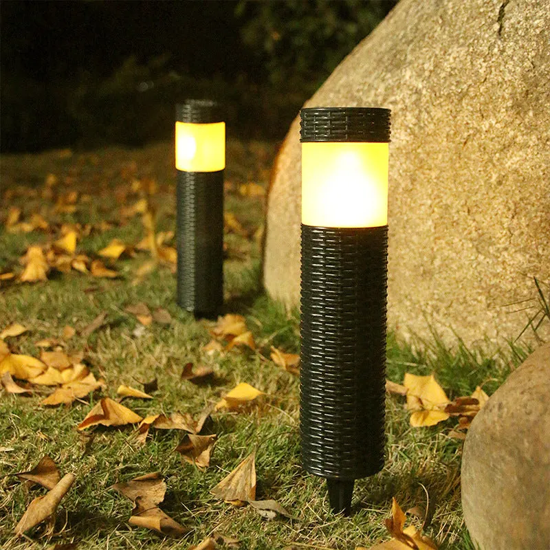 Outdoor waterproof solar garden light with abstract design and simulated flame effect lighting
