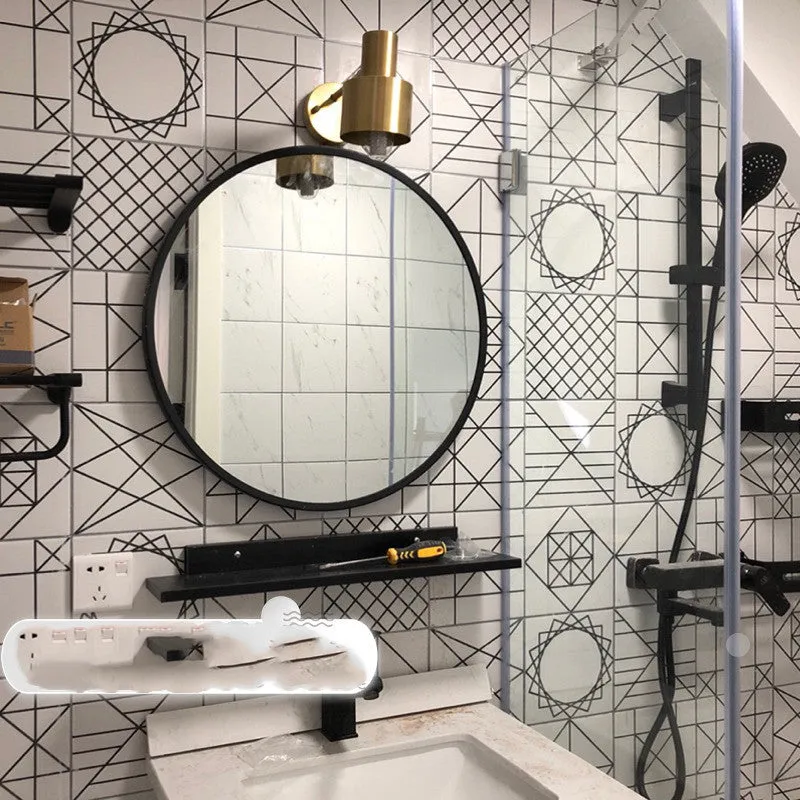 Round metal frame bathroom wall mirror in black finish showing 30cm diameter