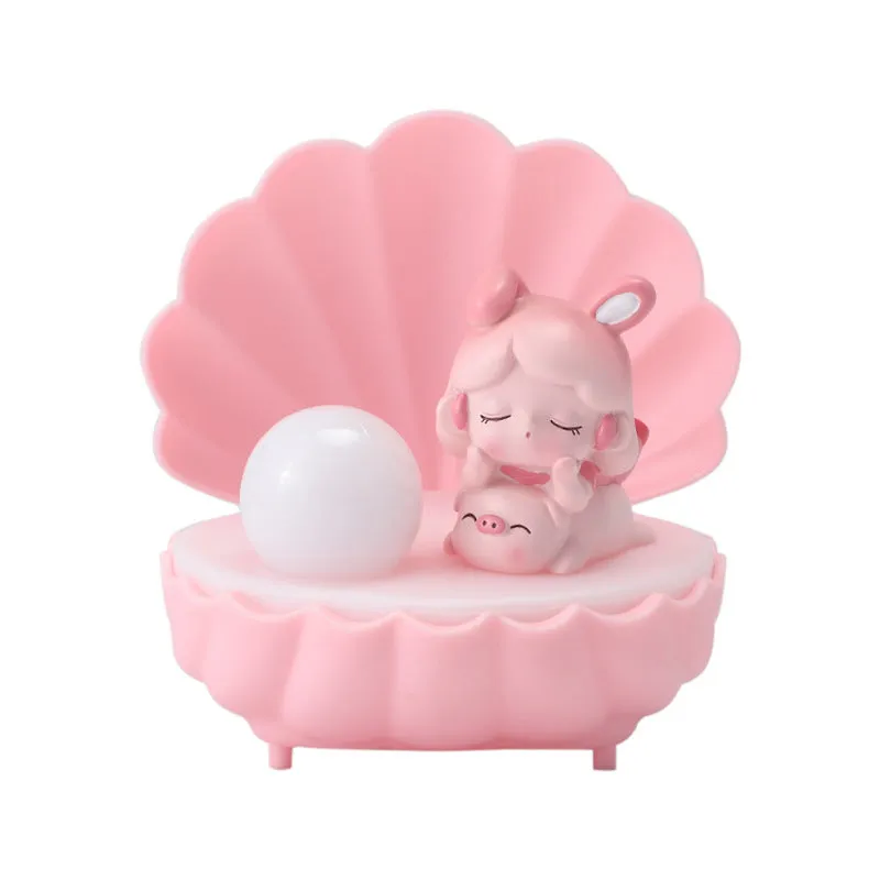 Cartoon character resin night light with shell star design on tabletop