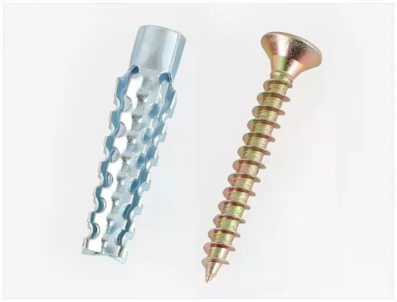 Metal expansion tube and screw set with serrated barbs for wall fixing in concrete and brick