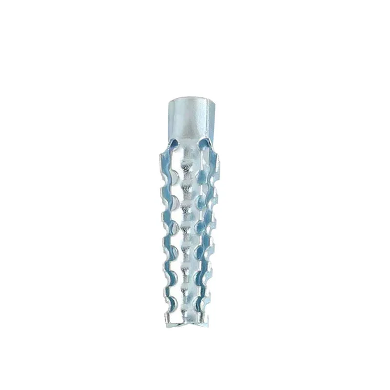 Metal expansion tube and screw set with serrated barbs for wall fixing in concrete and brick